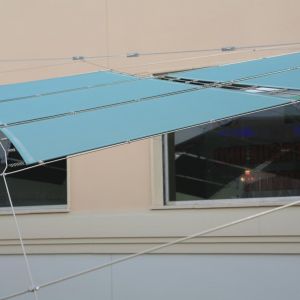Tensile structure with wire mesh